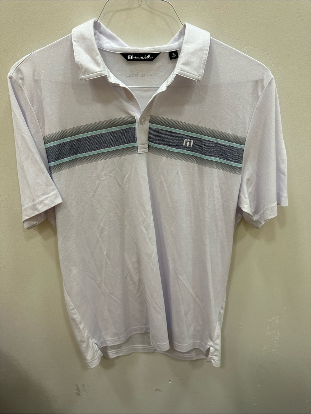 Travis Mathew White Polo with Gray and Mint Chest Stripe